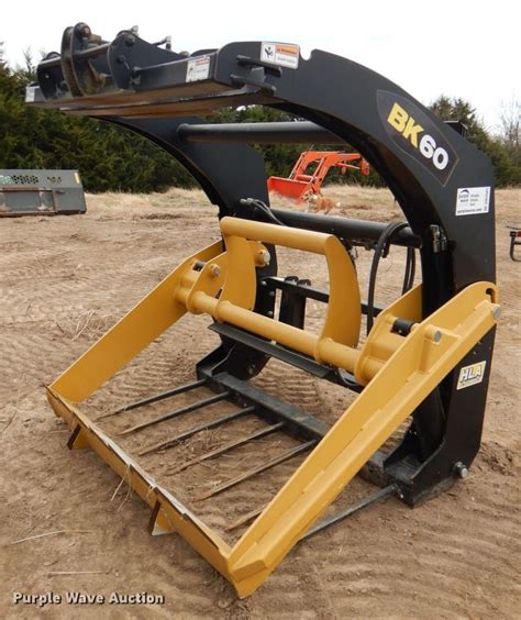 round bale shredder skid steer|round bale processor for sale.